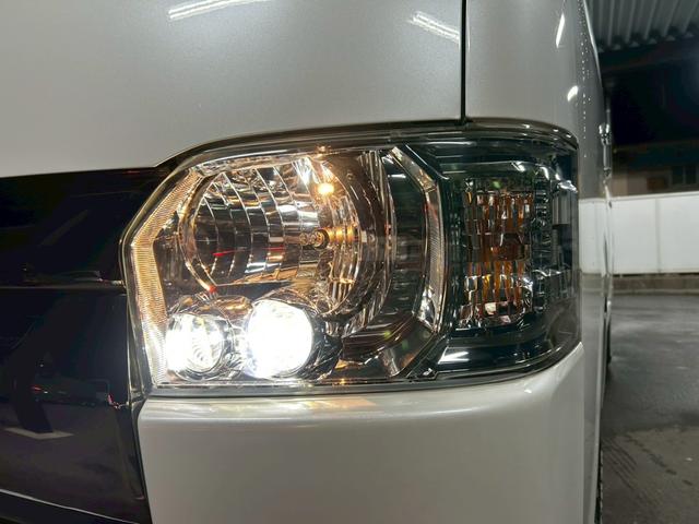 ハイエースバン スーパーＧＬ　ダークプライム　ベッドキット　両側電動スライド　ナビＴＶ　Ｂｌｕｅｔｏｏｔｈ　バックカメラ　スマートキー　ＥＴＣ　専用シート　純正１５インチＡＷ　ホワイトレタータイヤ　ＬＥＤヘッドライト　タイミングチェーン　禁煙車（10枚目）