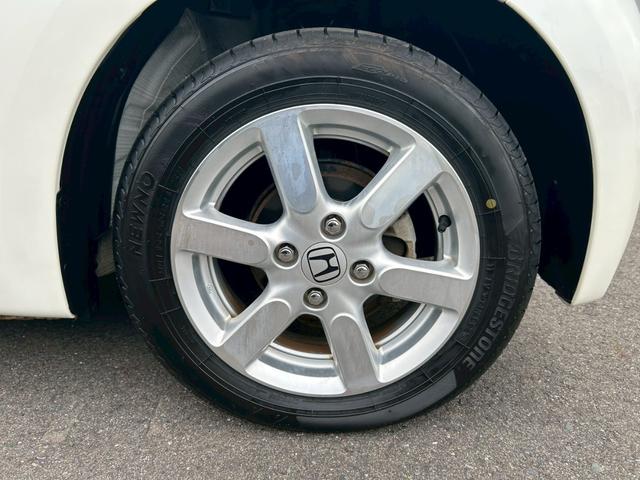 Ｎ－ＯＮＥ プレミアム　ツートーンカラー／純正ナビ／ＴＶ／ＣＤ・ＤＶＤ／Ｂｌｕｅｔｏｏｔｈ／ＥＴＣ／ＨＩＤヘッドライト／オートライト／エンジンスタートボタン／スマートキー／純正１４インチＡＷ（29枚目）