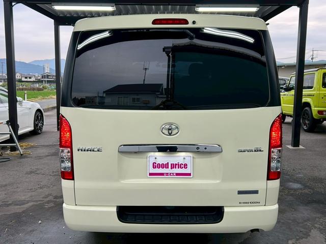 ハイエースバン スーパーＧＬ　リラクベース　タイプＩＩ　モデリスタ特装車　５型ディーゼル　専用１５インチＡＷ　ＴＯＹＯＴＡエンブレム付きグリル　専用シートカラー　白木目調ロンリュームフロア　白の久米町インパネ　ナビ　バックカメラ　スマートキー　ＥＴＣ２．０（5枚目）