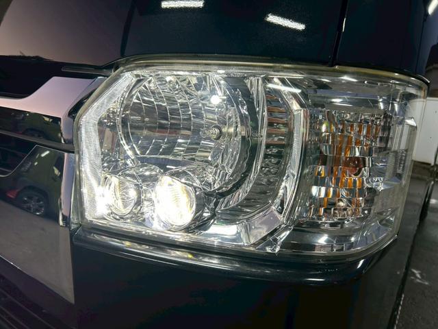 ハイエースバン ロングスーパーＧＬ　ベッドキット　ナビＴＶ　フリップダウンモニター　バックカメラ　ドラレコ　デイトナホイール　ＭＴタイヤ　ローダウン　フロントアンダースポイラー　ＬＥＤヘッドライト　ＥＴＣ　４型　タイミングチェーン駆動（11枚目）