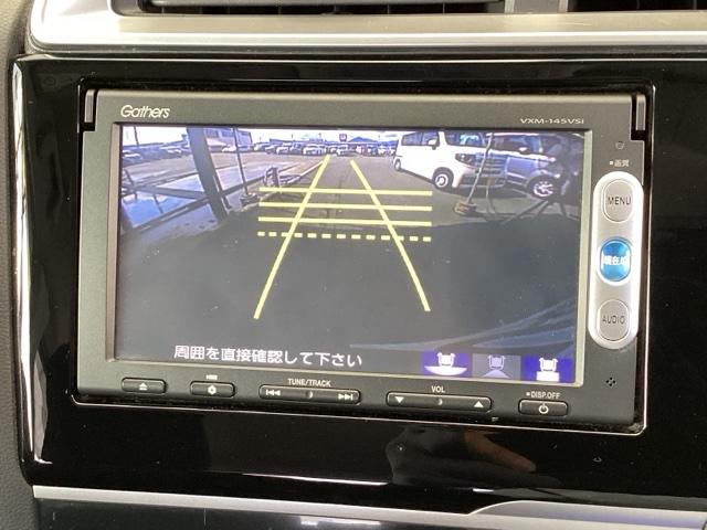 フィットハイブリッド Ｆパッケージ　純正メモリーナビ　リアカメラ　ＥＴＣ　盗難警報装置　記録簿有り　ＡＵＴＯエアコン　助手席エアバック　ＥＣＯＮ　リヤカメラ　ＡＢＳ付　ＤＶＤ視聴　横滑り防止システム　キーレスエントリー　運転席エアバック（12枚目）