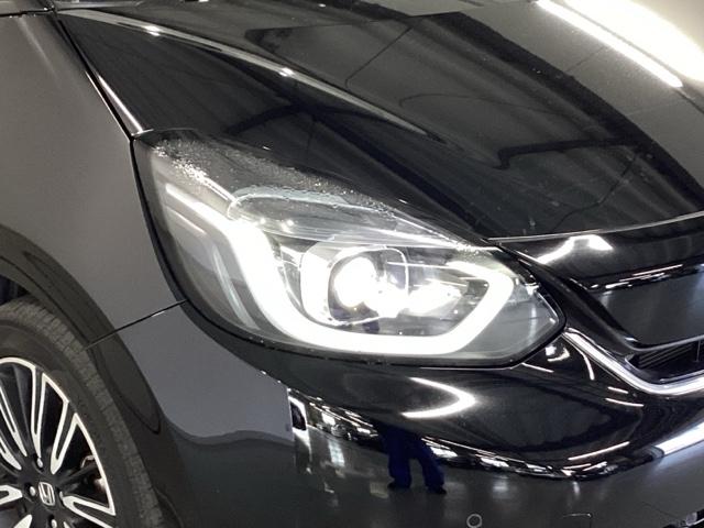 フィット リュクス　純正メモリーナビ　本革シート　ドラレコ　Ｂカメ　サイドエアバッグ　衝突軽減ブレーキ　クルーズコントロール　前席シートヒーター　ドライブレコーダー　パワステ　ＬＥＤヘッドライト　エアコン　ＡＢＳ　イモビ（22枚目）