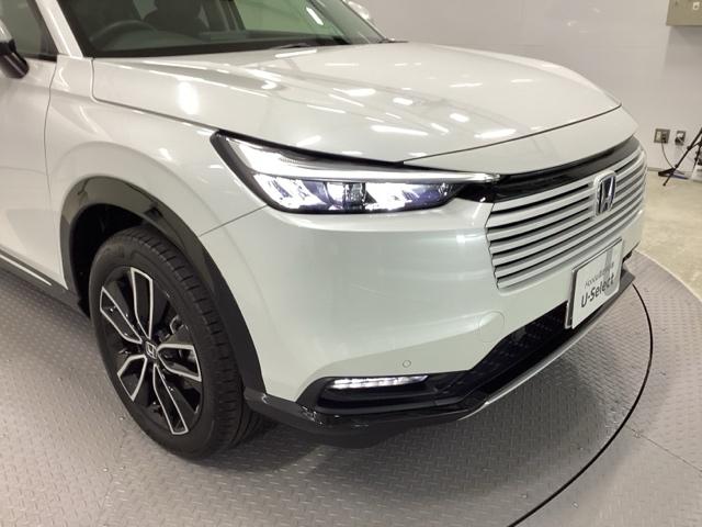 ヴェゼル ｅ：ＨＥＶＺ　メモリーナビ　ＥＴＣ　リアカメラ　シートヒーター　Ｓヒータ　地デジフルセグＴＶ　電動テールゲート　サイドエアバッグ　後カメラ　前後障害物センサー　横滑防止装置　エアコン　ＬＥＤヘットライト　パワステ（20枚目）