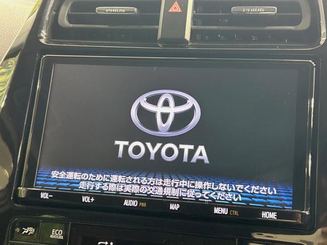 プリウス Ａ　禁煙車　純正９型ナビ　後期　レーダークルーズコントロール　衝突軽減装置　ＨＵＤ　ＢＳＭ　バックカメラ　ＬＥＤヘッドライト　パワーシート　フォグランプ　クリアランスソナー　パーキングアシスト（3枚目）