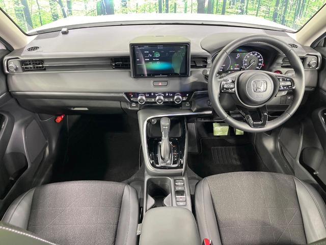 ヴェゼル ｅ：ＨＥＶ　Ｚ　９型ナビ　ホンダセンシング　バックカメラ　レーダークルーズ　禁煙車　電動リアゲート　ハーフレザーシート　ドラレコ　ステアリングヒーター　クリアランスソナー　ＬＥＤヘッド　ＥＴＣ　オートライト（2枚目）