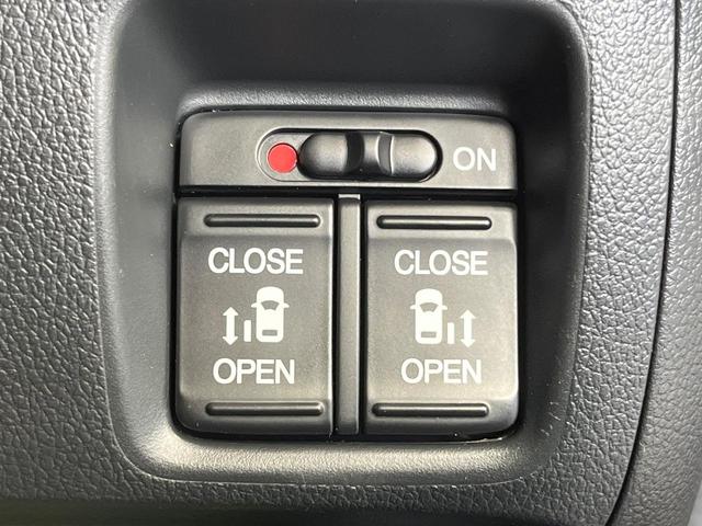 Ｎ－ＢＯＸカスタム Ｇ・ターボＬパッケージ　両側電動ドア　純正ＳＤナビ　バックカメラ　禁煙車　ハーフレザーシート　スマートキー　ＨＩＤヘッド　ビルトインＥＴＣ　クルコン　オートエアコン　純正１４インチアルミ　Ｂｌｕｅｔｏｏｔｈ　ＣＤ（3枚目）