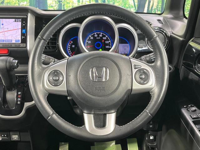 Ｎ－ＢＯＸカスタム Ｇ・ターボＬパッケージ　両側電動ドア　純正ＳＤナビ　バックカメラ　禁煙車　ハーフレザーシート　スマートキー　ＨＩＤヘッド　ビルトインＥＴＣ　クルコン　オートエアコン　純正１４インチアルミ　Ｂｌｕｅｔｏｏｔｈ　ＣＤ（11枚目）