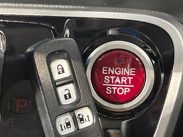 Ｎ－ＢＯＸカスタム Ｇ・ターボＬパッケージ　両側電動ドア　純正ＳＤナビ　バックカメラ　禁煙車　ハーフレザーシート　スマートキー　ＨＩＤヘッド　ビルトインＥＴＣ　クルコン　オートエアコン　純正１４インチアルミ　Ｂｌｕｅｔｏｏｔｈ　ＣＤ（26枚目）