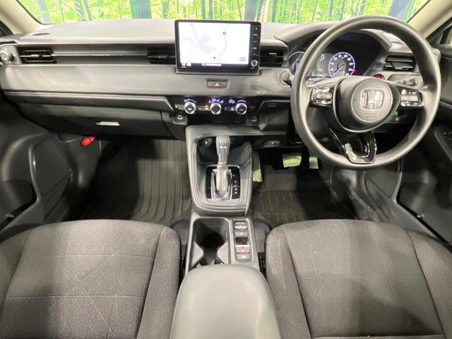 ヴェゼル e:HEV X 純正9型SDナビ バックカメラ レーダークルーズ 禁煙車 コーナーセンサー スマートキー LEDヘッド ビルトインETC 車線逸脱警報 オートライト オートエアコン 純正16インチアルミ(2枚目)