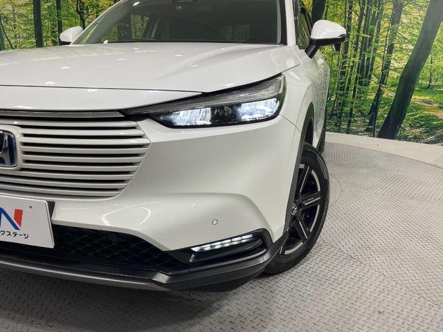 ヴェゼル e:HEV X 純正9型SDナビ バックカメラ レーダークルーズ 禁煙車 コーナーセンサー スマートキー LEDヘッド ビルトインETC 車線逸脱警報 オートライト オートエアコン 純正16インチアルミ(12枚目)