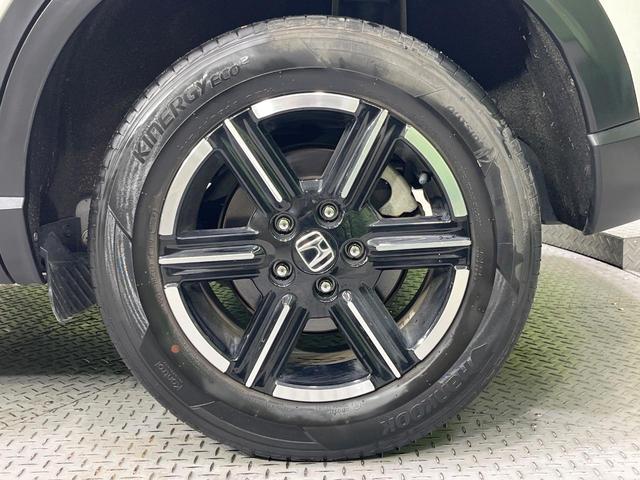 ヴェゼル e:HEV X 純正9型SDナビ バックカメラ レーダークルーズ 禁煙車 コーナーセンサー スマートキー LEDヘッド ビルトインETC 車線逸脱警報 オートライト オートエアコン 純正16インチアルミ(52枚目)