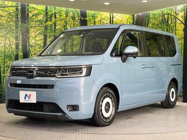 ステップワゴン ｅ：ＨＥＶエアー　両側電動ドア　純正８型ＳＤナビ　バックカメラ　衝突被害軽減システム　レーダークルーズ　禁煙車　ドラレコ　コーナーセンサー　スマートキー　ＬＥＤヘッド　ＥＴＣ　車線逸脱警報　オートライト　オートエアコン（64枚目）