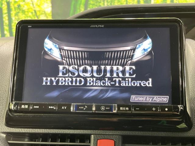 エスクァイア ハイブリッドGi ブラックテーラード 両側電動ドア BIGX9型ナビ 12型後席モニター バックカメラ 衝突被軽減装置 禁煙車 ドラレコ スマートキー LEDヘッド ビルトインETC クルコン オートハイビーム 車線逸脱警報 オートライト(3枚目)