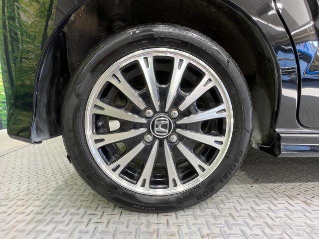 N-BOXカスタム G ターボSSパッケージ 両側電動ドア SDナビ バックカメラ 衝突被害軽減システム 禁煙車 スマートキー HIDヘッド ETC クルコン オートライト オートエアコン 純正15インチアルミ Bluetooth CD(27枚目)