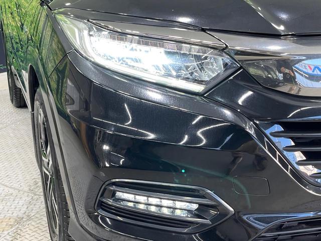 ヴェゼル ハイブリッドＺ・ホンダセンシング　純正ナビ　バックカメラ　衝突被害軽減システム　レーダークルーズ　禁煙車　レザーシート　ドラレコ　スマートキー　ＬＥＤヘッド　ビルトインＥＴＣ　純正１７インチアルミ　オートライト　デュアルエアコン（12枚目）