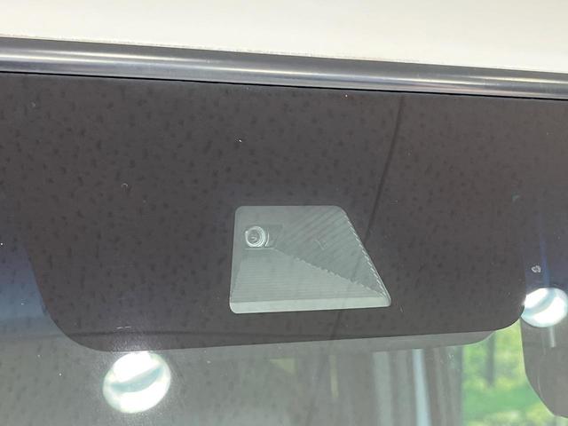 Ｎ－ＢＯＸカスタム Ｇ・Ｌターボホンダセンシング　純正ＳＤナビ　両側電動ドア　バックカメラ　レーダークルーズ　禁煙車　ハーフレザーシート　ドラレコ　コーナーセンサー　ＬＥＤヘッド　ビルトインＥＴＣ　純正１５インチアルミ　車線逸脱警報　オートライト（3枚目）