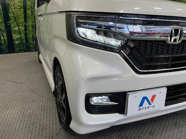 Ｎ－ＢＯＸカスタム Ｇ・Ｌターボホンダセンシング　純正ＳＤナビ　両側電動ドア　バックカメラ　レーダークルーズ　禁煙車　ハーフレザーシート　ドラレコ　コーナーセンサー　ＬＥＤヘッド　ビルトインＥＴＣ　純正１５インチアルミ　車線逸脱警報　オートライト（12枚目）