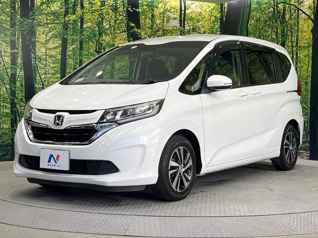 フリード Ｇ　純正ナビ　電動スライドドア　バックカメラ　禁煙車　ハーフレザーシート　ドラレコ　スマートキー　ＬＥＤヘッド　ＥＴＣ　純正１５インチアルミ　オートライト　オートエアコン　Ｂｌｕｅｔｏｏｔｈ　ＣＤ（55枚目）