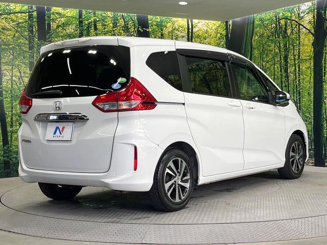 フリード Ｇ　純正ナビ　電動スライドドア　バックカメラ　禁煙車　ハーフレザーシート　ドラレコ　スマートキー　ＬＥＤヘッド　ＥＴＣ　純正１５インチアルミ　オートライト　オートエアコン　Ｂｌｕｅｔｏｏｔｈ　ＣＤ（58枚目）