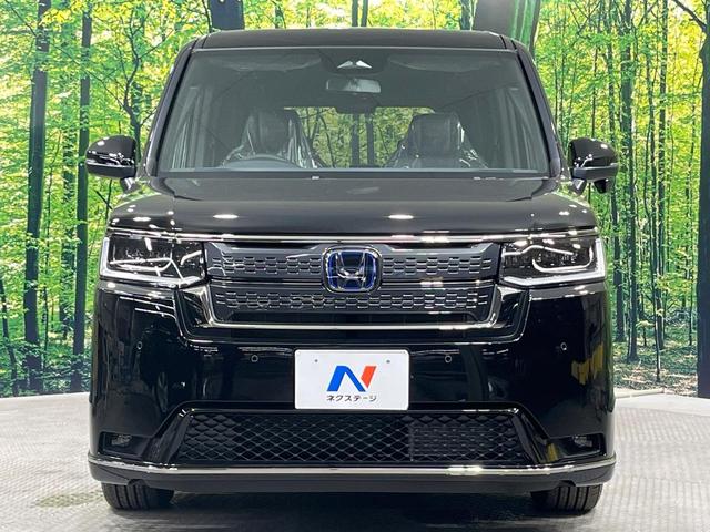 ステップワゴン ｅ：ＨＥＶスパーダ　登録済未使用車　両側電動ドア　衝突被害軽減システム　レーダークルーズ　電動リアゲート　合皮コンビシート　コーナーセンサー　シートヒーター　ＬＥＤヘッドライト　純正１６インチアルミホイール　車線逸脱警報（15枚目）