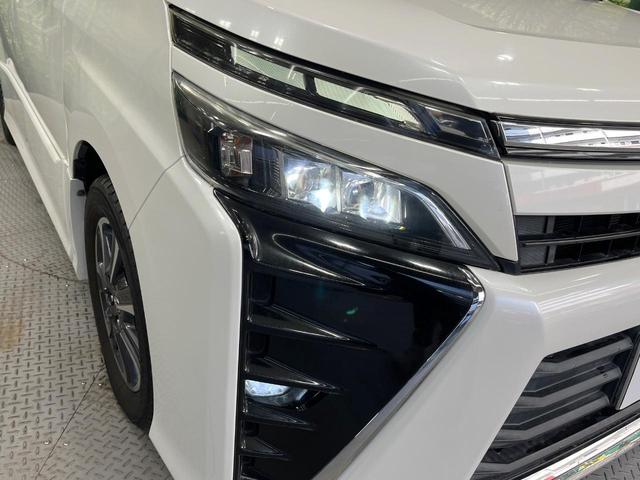 ヴォクシー ＺＳ　禁煙車　両側電動ドア　純正９型ＳＤナビ　１２型後席モニター　バックカメラ　衝突被害軽減システム　ドラレコ　コーナーセンサー　ＬＥＤヘッド　クルコン　純正１６インチアルミ　オートハイビーム（13枚目）