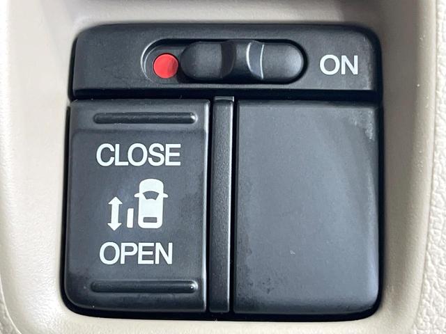 Ｎ－ＢＯＸ Ｇ・Ｌパッケージ　禁煙車　電動スライドドア　純正ＳＤナビ　バックカメラ　ＨＩＤヘッドライト　オートエアコン　パワーウィンドウ　パワーステアリング　電動格納ミラー　プライバシーガラス　ロールサンシェード　アームレスト（7枚目）