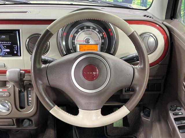 アルトラパンショコラ G 禁煙車 スマートキー HIDヘッドライト 純正14インチアルミホイール オートライト CD再生 AM FM再生 プッシュスタート 電動格納ミラー アイドリングストップ ドアバイザー(11枚目)