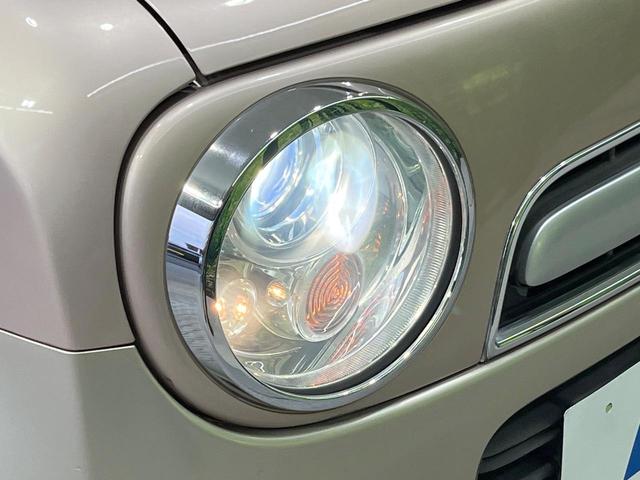 アルトラパンショコラ G 禁煙車 スマートキー HIDヘッドライト 純正14インチアルミホイール オートライト CD再生 AM FM再生 プッシュスタート 電動格納ミラー アイドリングストップ ドアバイザー(12枚目)