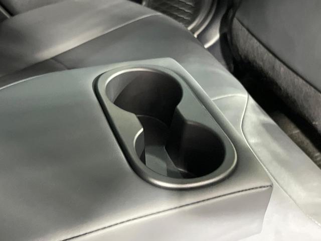 プリウス Ａツーリングセレクション　禁煙車　モデリスタフルエアロ　純正９型ナビ　全周囲カメラ　衝突被害軽減システム　ＥＴＣ２．０　Ｂｌｕｅｔｏｏｔｈ　レーダークルーズ　パワーシート　コーナーセンサー　シートヒーター　合皮レザーシート（64枚目）