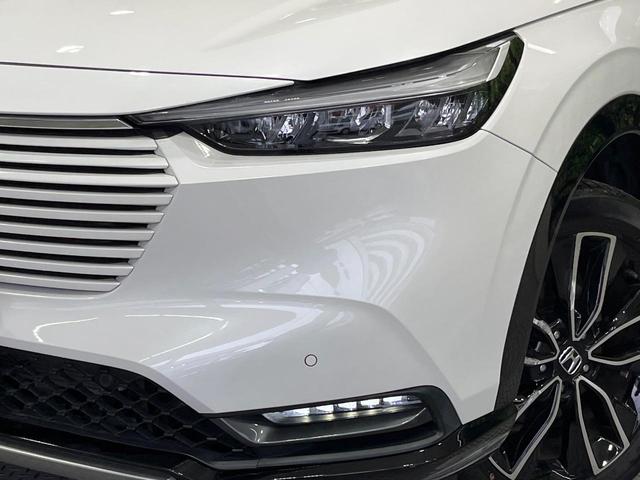 ヴェゼル ｅ：ＨＥＶ　Ｚ　禁煙車　純正９型ナビ　バックカメラ　衝突被害軽減システム　レーダークルーズ　電動リアゲート　ドラレコ　コーナーセンサー　スマートキー　ＬＥＤヘッド　ＥＴＣ２．０　純正１８インチアルミ　オートライト（12枚目）