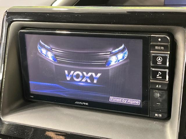 ヴォクシー ＺＳ　煌ＩＩ　禁煙車　両側電動ドア　ＳＤナビ　１２型後席モニター　バックカメラ　衝突被害軽減システム　スマートキー　ＬＥＤヘッド　ビルトインＥＴＣ　純正１７インチアルミ　車線逸脱警報　オートライト　デュアルエアコン（5枚目）
