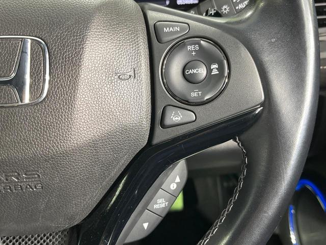 ヴェゼル ハイブリッドＲＳ・ホンダセンシング　禁煙車　純正ＳＤナビ　バックカメラ　衝突被害軽減システム　レーダークルーズ　シートヒーター　純正１８インチアルミ　車線逸脱警報　オートエアコン　Ｂｌｕｅｔｏｏｔｈ　ハーフレザーシート　ＤＶＤ再生（6枚目）