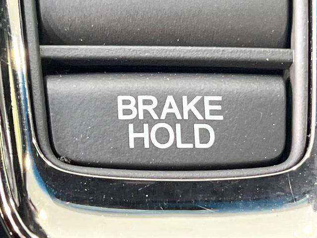 ヴェゼル ハイブリッドＲＳ・ホンダセンシング　禁煙車　純正ＳＤナビ　バックカメラ　衝突被害軽減システム　レーダークルーズ　シートヒーター　純正１８インチアルミ　車線逸脱警報　オートエアコン　Ｂｌｕｅｔｏｏｔｈ　ハーフレザーシート　ＤＶＤ再生（34枚目）