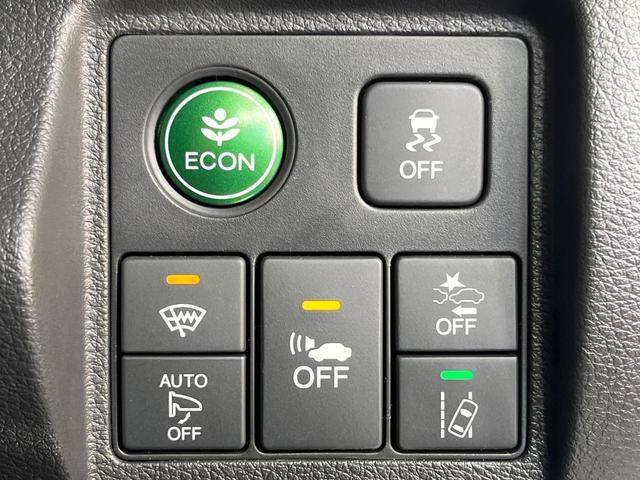 ヴェゼル ハイブリッドＲＳ・ホンダセンシング　禁煙車　純正ＳＤナビ　バックカメラ　衝突被害軽減システム　レーダークルーズ　シートヒーター　純正１８インチアルミ　車線逸脱警報　オートエアコン　Ｂｌｕｅｔｏｏｔｈ　ハーフレザーシート　ＤＶＤ再生（51枚目）