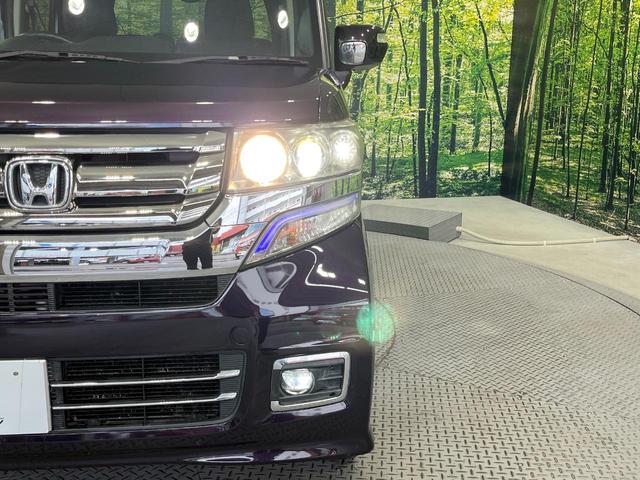 N-BOXカスタム G・ターボLパッケージ 禁煙車 両側電動ドア 純正SDナビ バックカメラ 合皮コンビシート スマートキー HIDヘッド ETC クルコン 純正15インチアルミ オートエアコン Bluetooth CD DVD再生(12枚目)