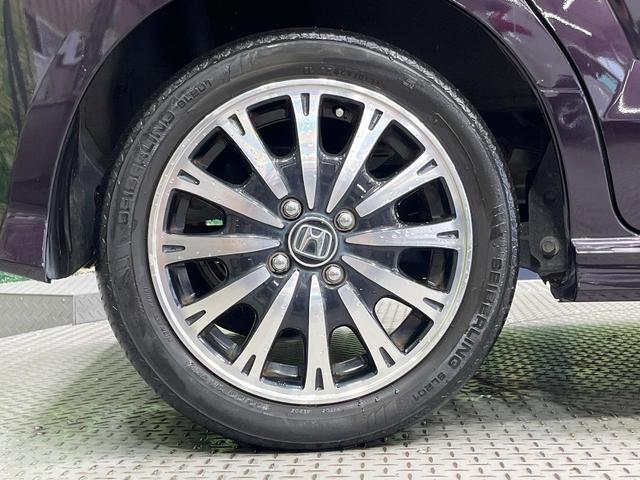 N-BOXカスタム G・ターボLパッケージ 禁煙車 両側電動ドア 純正SDナビ バックカメラ 合皮コンビシート スマートキー HIDヘッド ETC クルコン 純正15インチアルミ オートエアコン Bluetooth CD DVD再生(28枚目)