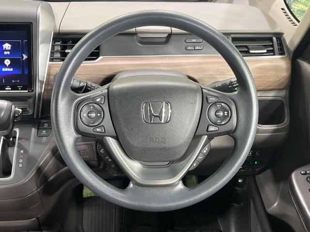 フリード Ｇ・ホンダセンシング　禁煙車　両側電動ドア　純正９型ナビ　バックカメラ　衝突被害軽減システム　スマートキー　ビルトインＥＴＣ　クルコン　車線逸脱警報　シートヒーター　オートエアコン　Ｂｌｕｅｔｏｏｔｈ　ロールサンシェード（12枚目）