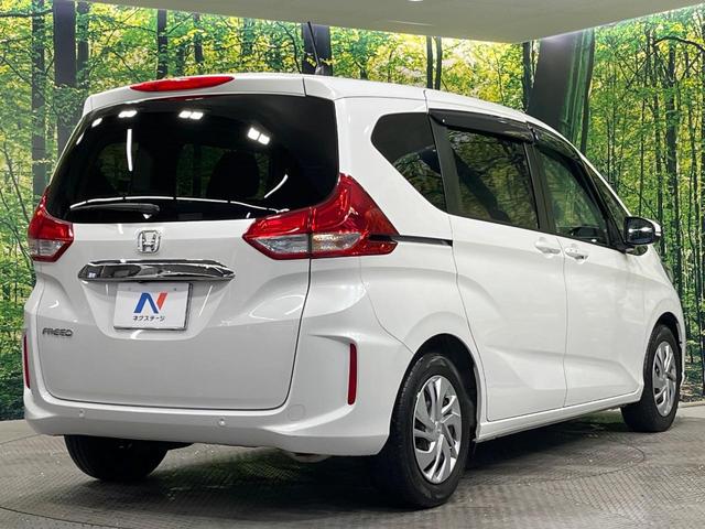 フリード Ｇ・ホンダセンシング　禁煙車　両側電動ドア　純正９型ナビ　バックカメラ　衝突被害軽減システム　スマートキー　ビルトインＥＴＣ　クルコン　車線逸脱警報　シートヒーター　オートエアコン　Ｂｌｕｅｔｏｏｔｈ　ロールサンシェード（18枚目）
