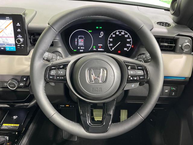 ヴェゼル ｅ：ＨＥＶ　Ｚ・ＰＬａＹパッケージ　登録済未使用車　パノラマルーフ　純正９型ＤＡ　全周囲カメラ　ホンダセンシング　ＥＴＣ２．０　合皮コンビシート　シートヒーター　レーダークルーズ　電動リアゲート　純正１８インチアルミ　デュアルエアコン（11枚目）