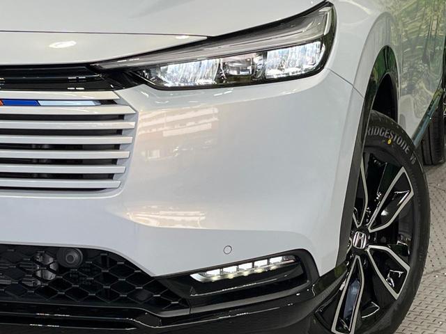 ヴェゼル ｅ：ＨＥＶ　Ｚ・ＰＬａＹパッケージ　登録済未使用車　パノラマルーフ　純正９型ＤＡ　全周囲カメラ　ホンダセンシング　ＥＴＣ２．０　合皮コンビシート　シートヒーター　レーダークルーズ　電動リアゲート　純正１８インチアルミ　デュアルエアコン（12枚目）