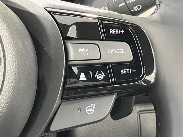 ヴェゼル ｅ：ＨＥＶ　Ｚ・ＰＬａＹパッケージ　登録済未使用車　パノラマルーフ　純正９型ＤＡ　全周囲カメラ　ホンダセンシング　ＥＴＣ２．０　合皮コンビシート　シートヒーター　レーダークルーズ　電動リアゲート　純正１８インチアルミ　デュアルエアコン（30枚目）