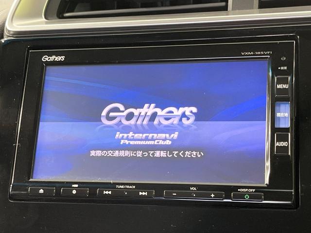 フィットハイブリッド F 禁煙車 純正8型SDナビ バックカメラ 衝突被害軽減システム レーダークルーズ ドラレコ スマートキー ビルトインETC 車線逸脱警報 オートエアコン Bluetooth CD DVD フルセグTV(4枚目)