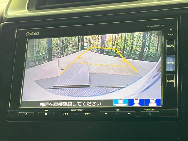 フィットハイブリッド F 禁煙車 純正8型SDナビ バックカメラ 衝突被害軽減システム レーダークルーズ ドラレコ スマートキー ビルトインETC 車線逸脱警報 オートエアコン Bluetooth CD DVD フルセグTV(5枚目)