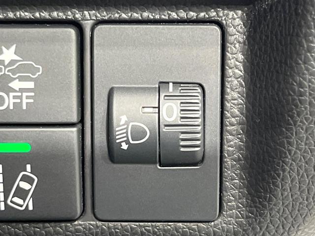 フィットハイブリッド F 禁煙車 純正8型SDナビ バックカメラ 衝突被害軽減システム レーダークルーズ ドラレコ スマートキー ビルトインETC 車線逸脱警報 オートエアコン Bluetooth CD DVD フルセグTV(24枚目)