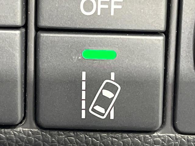 フィットハイブリッド F 禁煙車 純正8型SDナビ バックカメラ 衝突被害軽減システム レーダークルーズ ドラレコ スマートキー ビルトインETC 車線逸脱警報 オートエアコン Bluetooth CD DVD フルセグTV(26枚目)