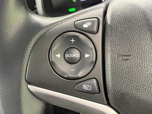 フィットハイブリッド F 禁煙車 純正8型SDナビ バックカメラ 衝突被害軽減システム レーダークルーズ ドラレコ スマートキー ビルトインETC 車線逸脱警報 オートエアコン Bluetooth CD DVD フルセグTV(31枚目)