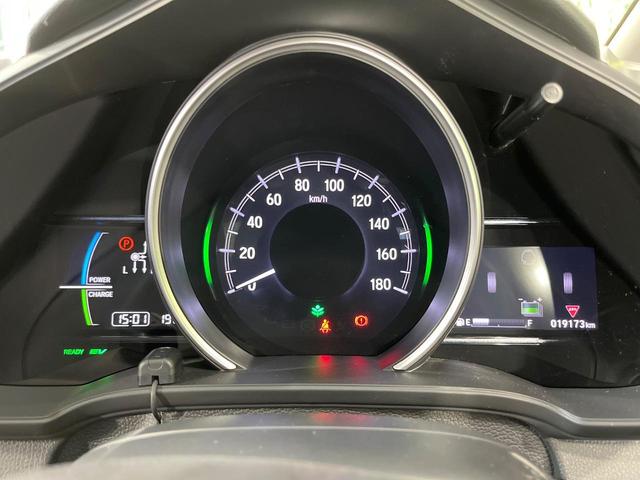 フィットハイブリッド F 禁煙車 純正8型SDナビ バックカメラ 衝突被害軽減システム レーダークルーズ ドラレコ スマートキー ビルトインETC 車線逸脱警報 オートエアコン Bluetooth CD DVD フルセグTV(33枚目)