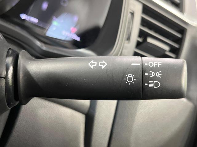 フィットハイブリッド F 禁煙車 純正8型SDナビ バックカメラ 衝突被害軽減システム レーダークルーズ ドラレコ スマートキー ビルトインETC 車線逸脱警報 オートエアコン Bluetooth CD DVD フルセグTV(34枚目)