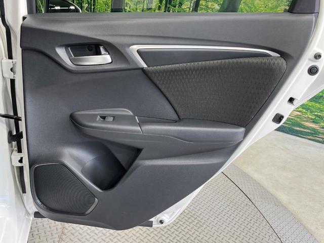 フィットハイブリッド F 禁煙車 純正8型SDナビ バックカメラ 衝突被害軽減システム レーダークルーズ ドラレコ スマートキー ビルトインETC 車線逸脱警報 オートエアコン Bluetooth CD DVD フルセグTV(49枚目)