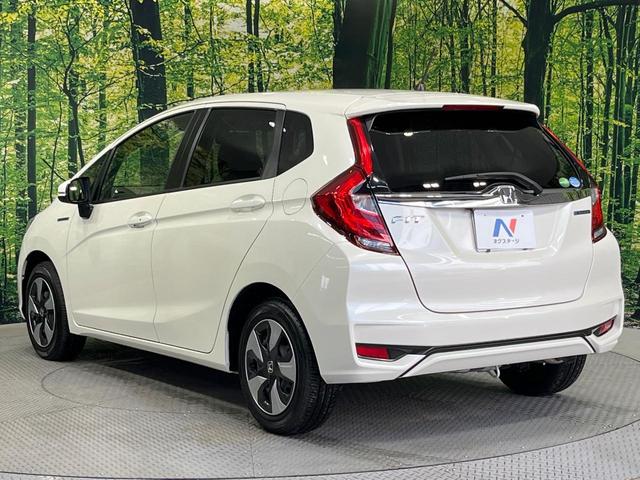 フィットハイブリッド F 禁煙車 純正8型SDナビ バックカメラ 衝突被害軽減システム レーダークルーズ ドラレコ スマートキー ビルトインETC 車線逸脱警報 オートエアコン Bluetooth CD DVD フルセグTV(65枚目)